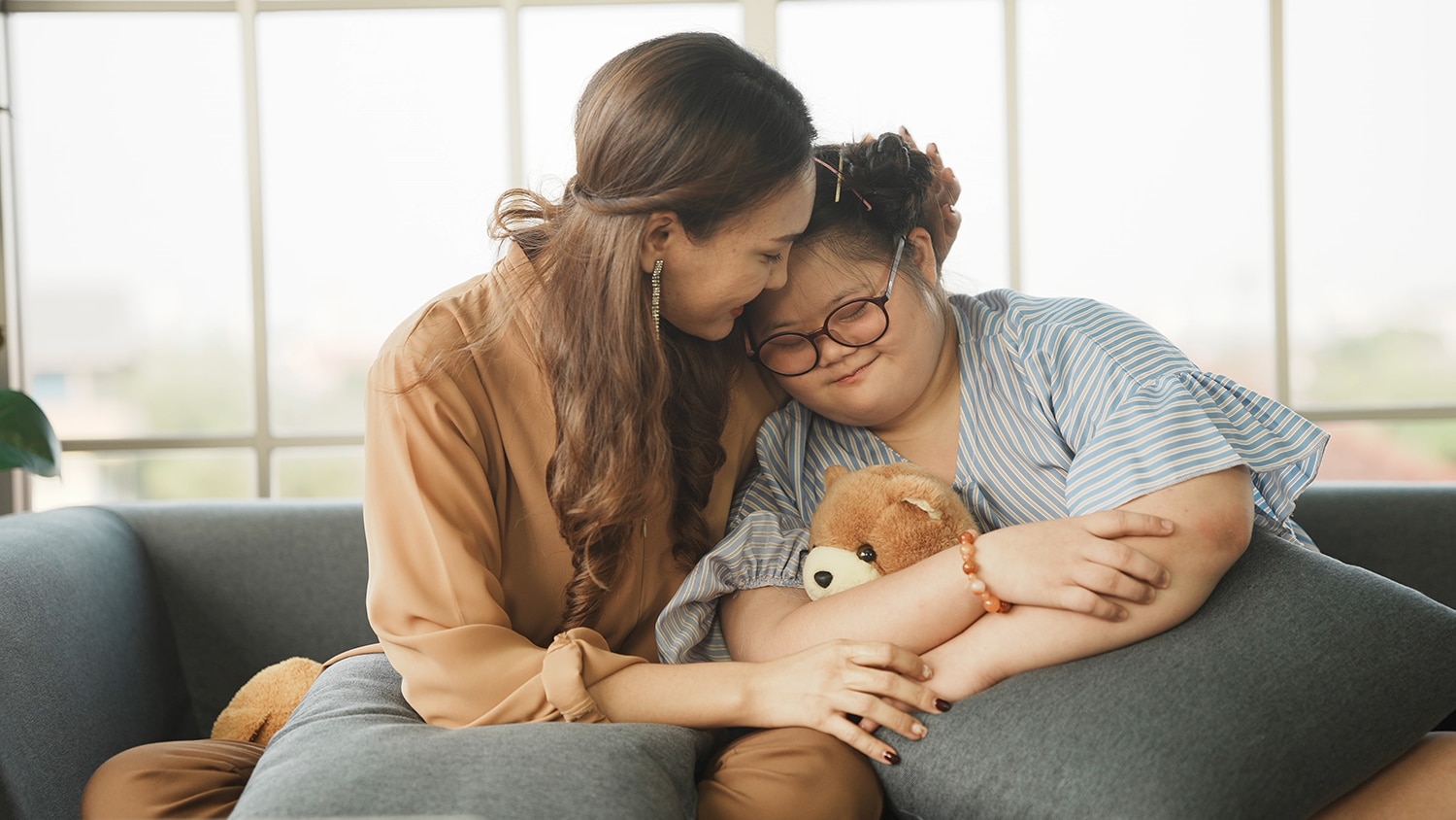 Mother daughter hugging